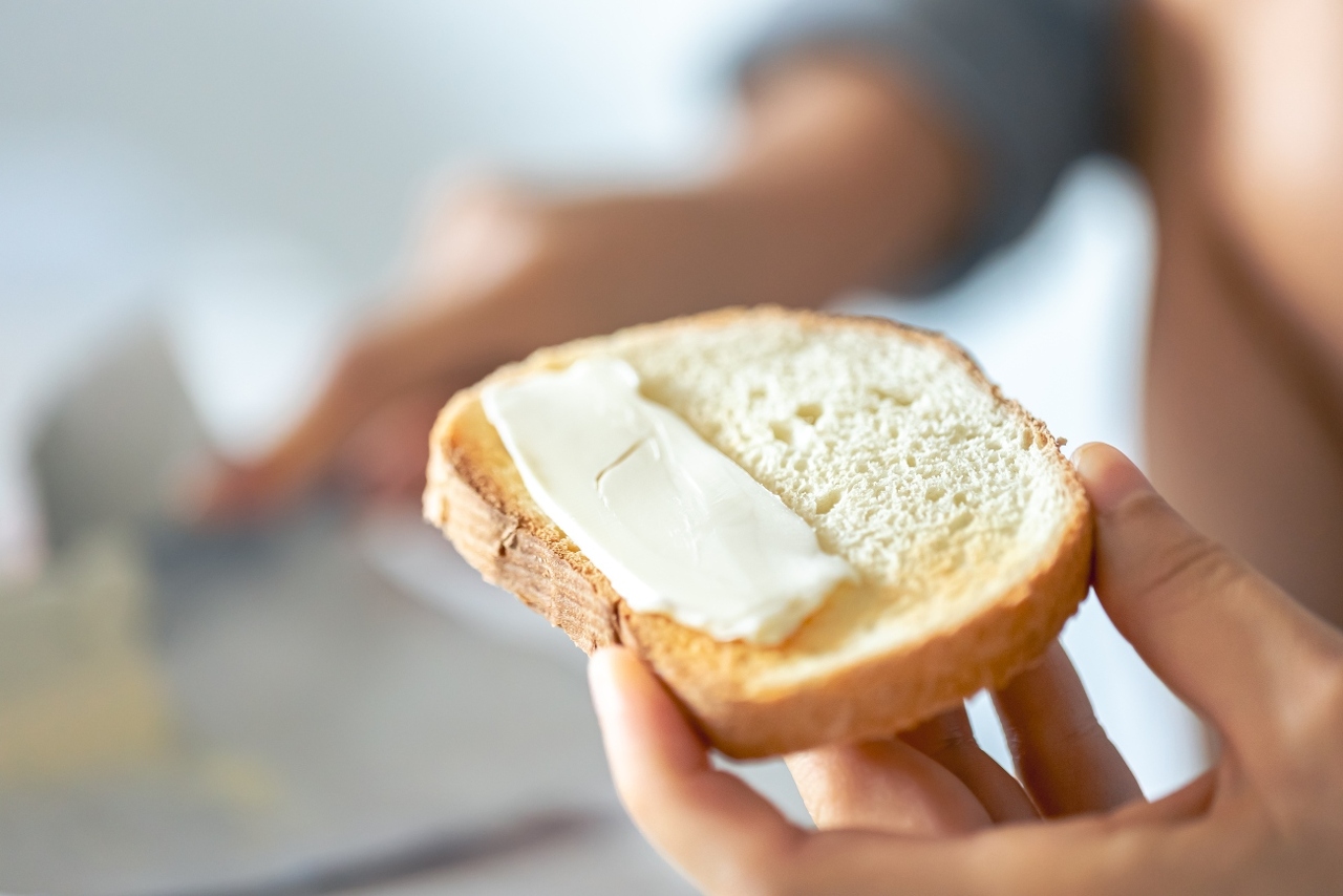 piece-bread-with-butter-womans-hand (1)
